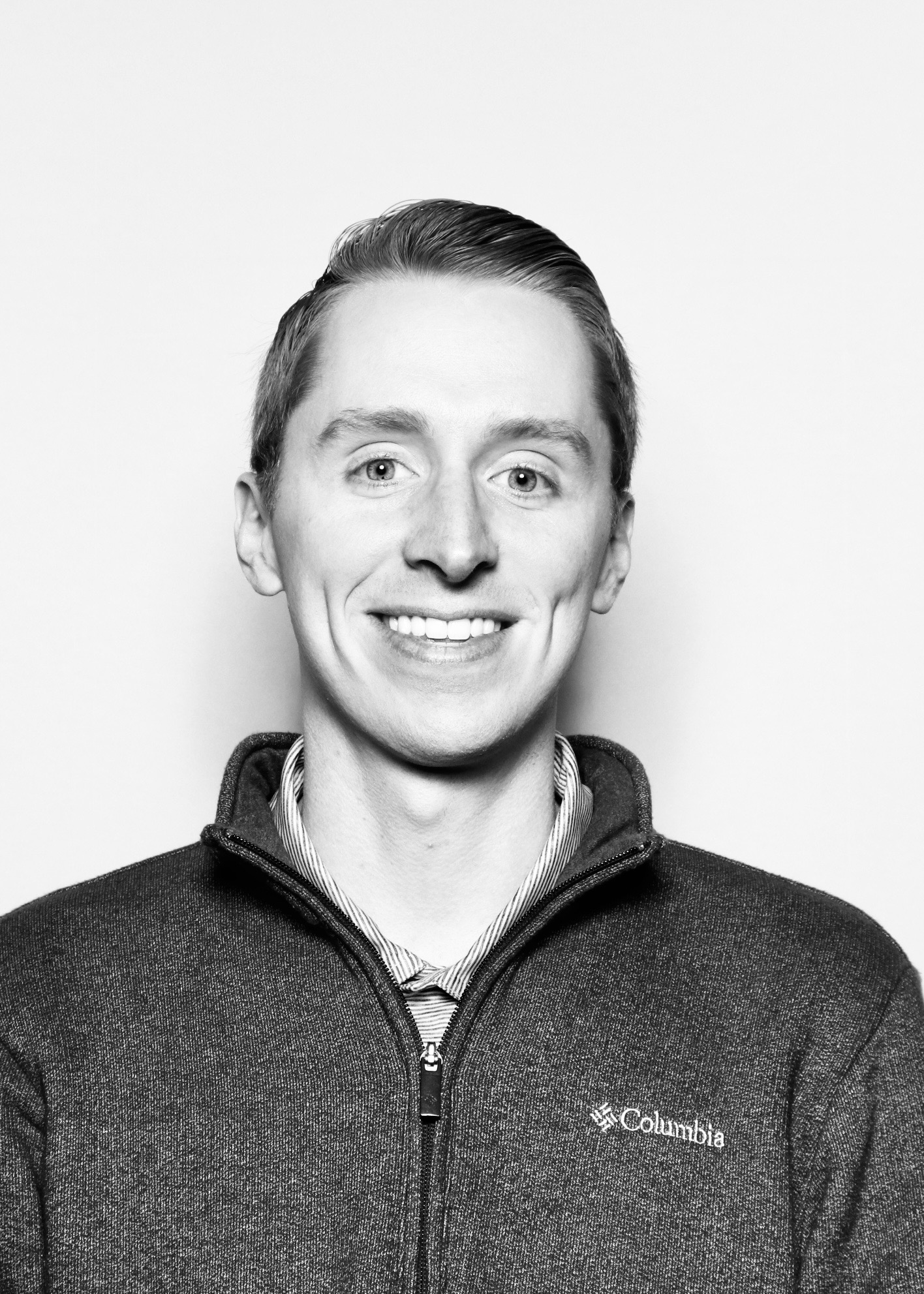 Black-and-white headshot of the creator
